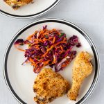 Plate with oven fried chicken.