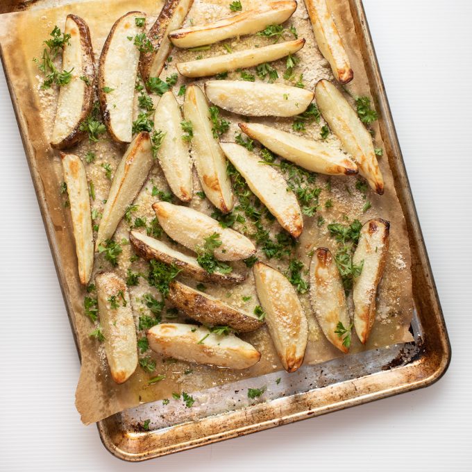 Oven baked fries on a cookie sheet.