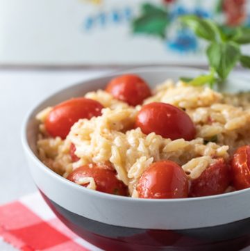 Bowl of Orzo with Tomatoes, Basil and Ricotta.