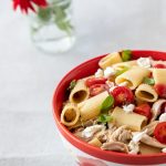 Bowl of caprese chicken pasta salad.