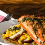 Broiled Salmon with corn and potatoes.