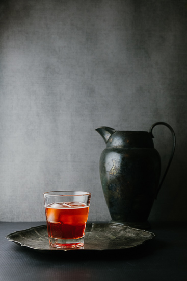 Dark red cocktail on a silver plattter