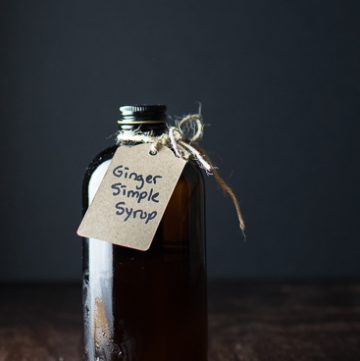 Brown bottle with tag reading ginger simple syrup