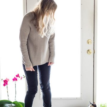 Philosophy sweater with black pants and flats,