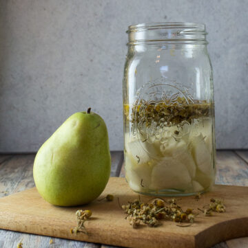 Vodka with pears and chamomile flowers.