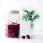 Brandied cranberries in a mason jar.