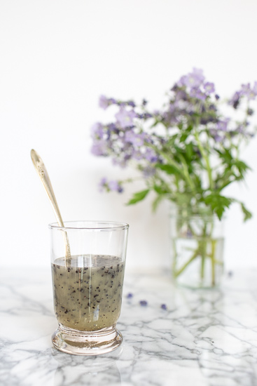 Small jar of lemon poppy seed dressing.