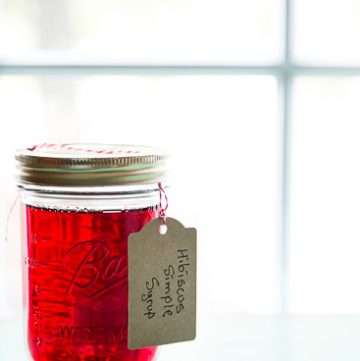 Jar filled with bright red liquid.