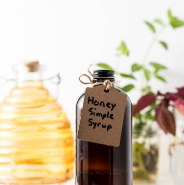 Brown Bottle with tag reading Honey Simple Syrup