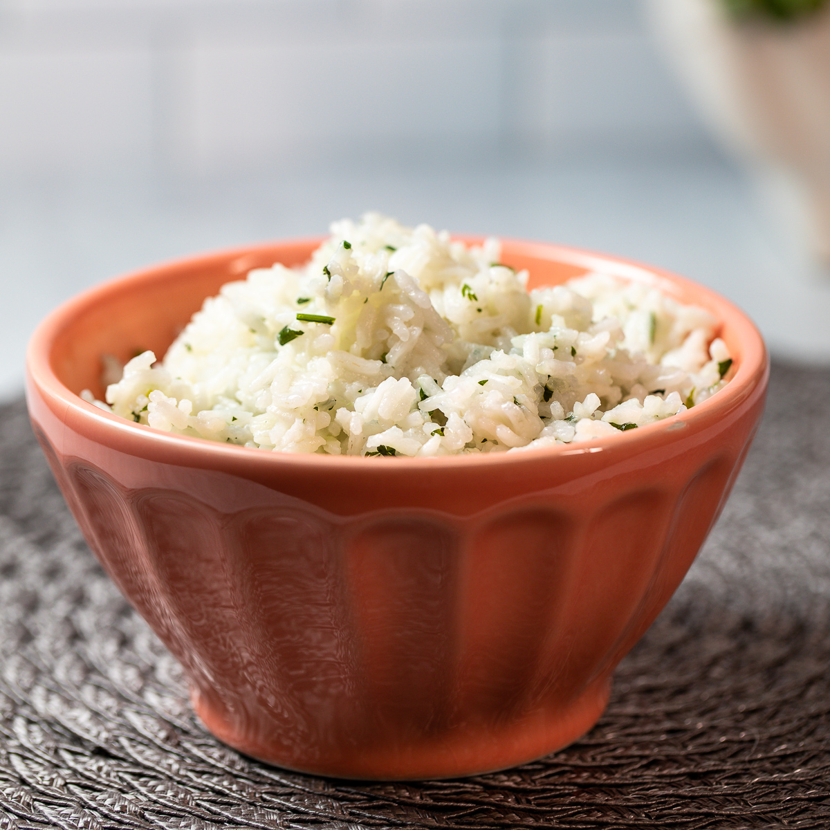 Orange bowl filled with rice.