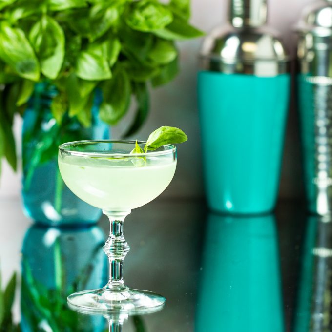 Light green cocktail in a coupe glass.