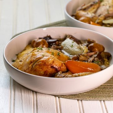 Bowl of roast chicken with vegetables.