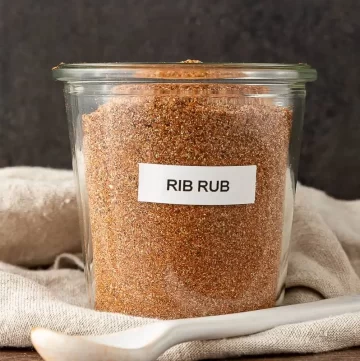Jar filled with rub with label on it saying rib rub.