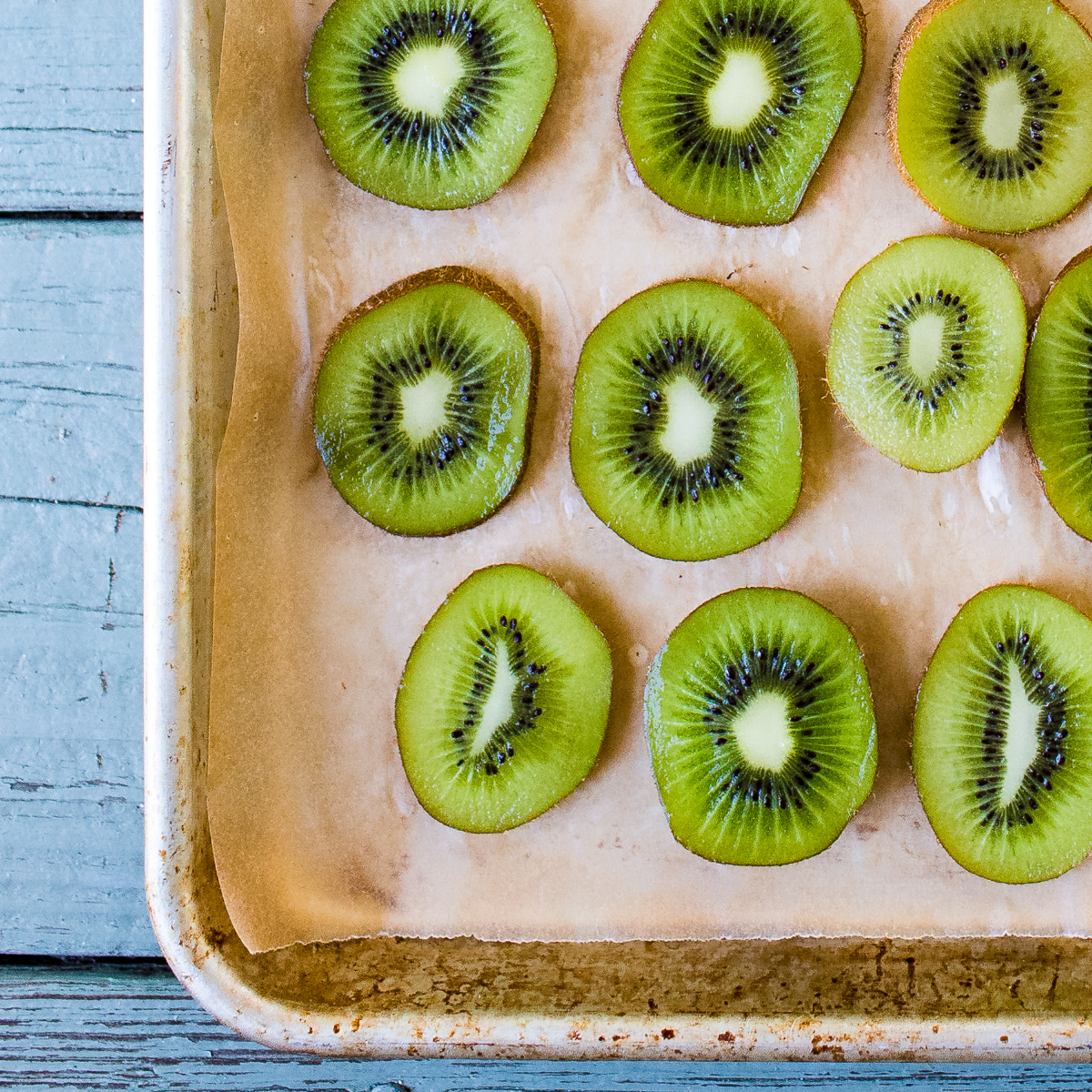 Kiwi frozen on a baking sheet.