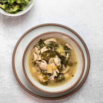 Chicken dijon stew in a bowl on a plate.