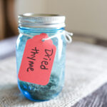 Blue jar with dried thym tag.